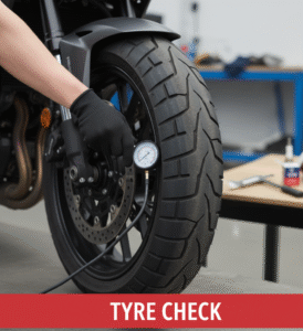 Checking bike tyre pressure and tread wear. Bike Maintenance Check List